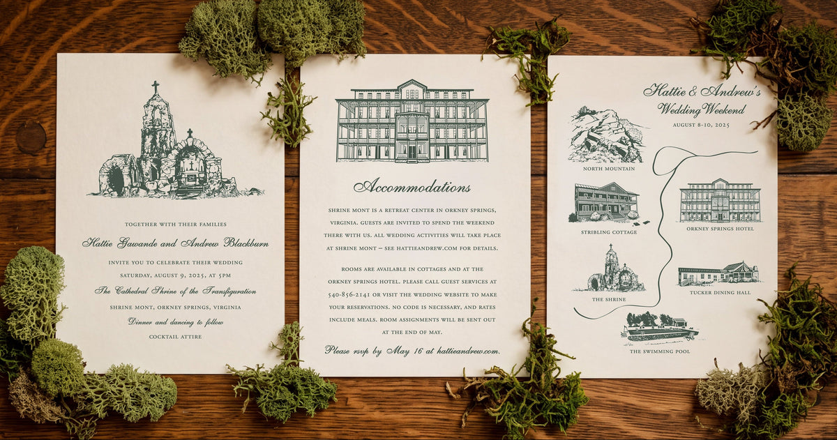 Three wedding invitation cards arranged in a flat lay on a dark wood surface, decorated with green moss and small botanical sprigs. The cards feature green line drawings for an invitation, accommodations, and itinerary sections.